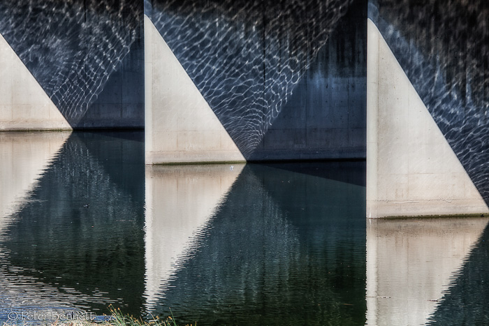 Reflections under bridge