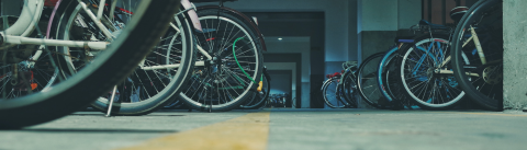 Parked bicycle lot photo - via unsplash