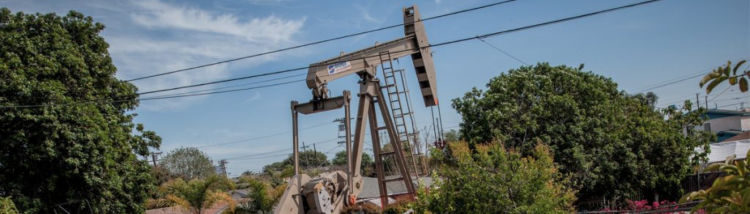 Oil pumpjack only a few hundred feet from homes