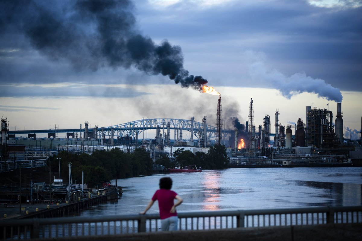 Flames and smoke rise after a series of explosions at the Philadelphia Energy Solutions Refining Complex on June 21, 2019. Matt Rourke / AP file