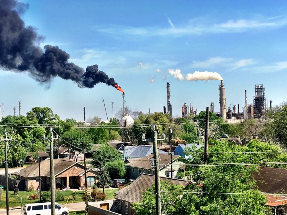 A flare from the Valero refinery on March 22, 2018, overlooking the community of Manchester in Houst