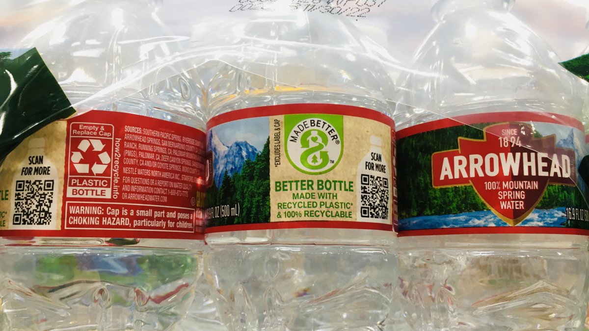 Plastic water bottles with 100% recycled plastic* and 100% recyclable branding 