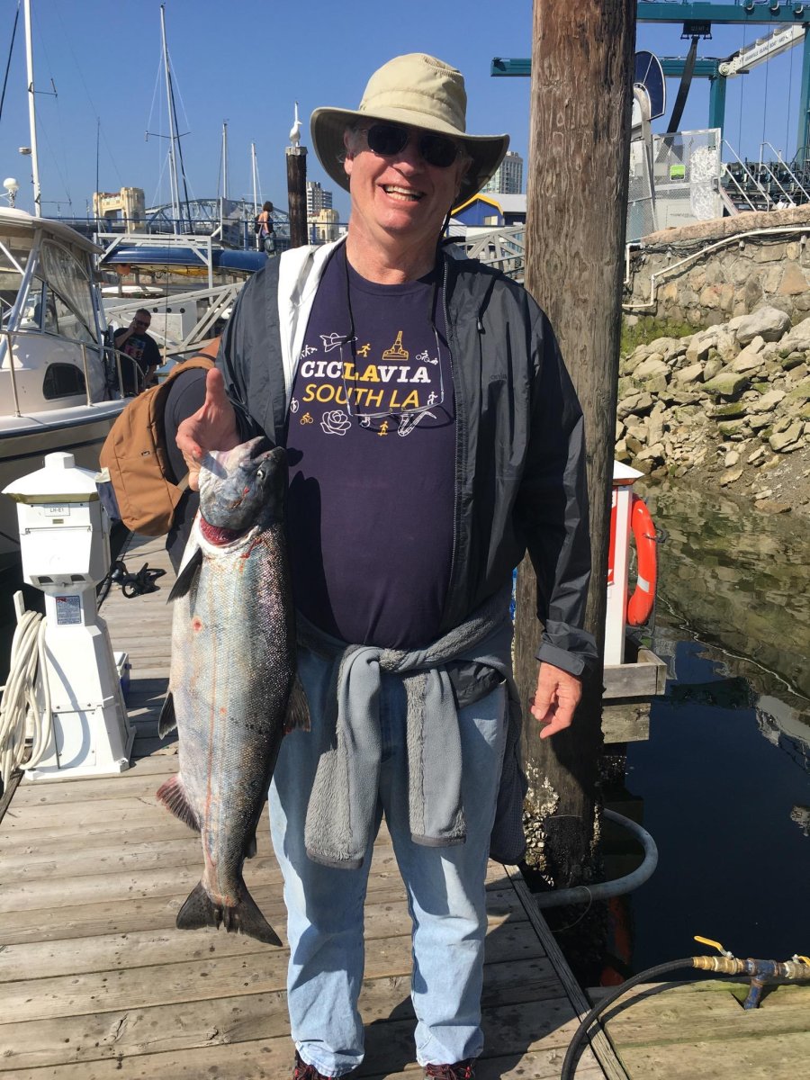 Conner Everts holds a Small Chinook Salmon in British Columbia