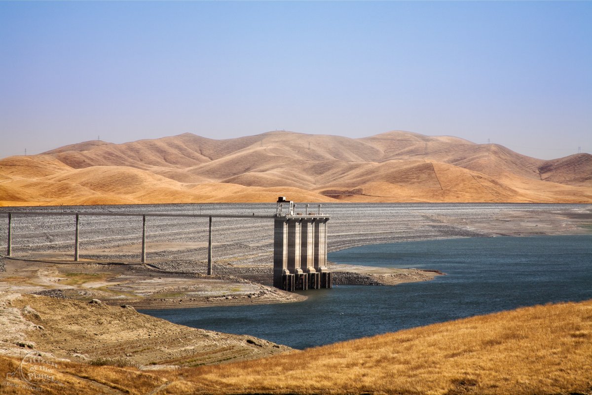 The San Luis Dam and San Luis Reservoir is a water-storage "off-stream" reservoir and is typically low in late summer due to its heavy usage for irrigation, Merced County, California, USA Peter Bennett all rights reserved