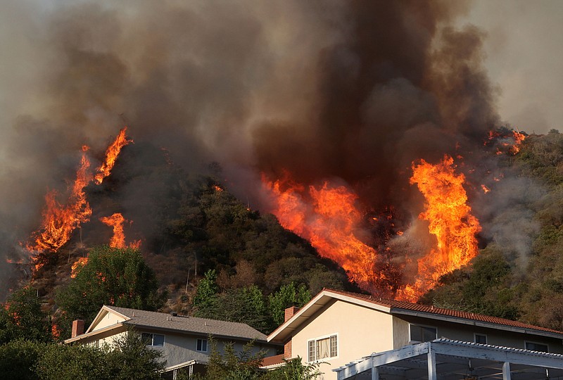 Flames approach homes in La Crescenta, California Justin Sullivan Getty Images